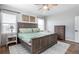 Comfortable main bedroom featuring a large bed, ample natural light, and modern furnishings at 2028 Trail Stone Ct, Castle Rock, CO 80108
