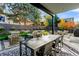 Inviting backyard patio with outdoor dining and lounge seating, perfect for entertaining at 42 S Ash St, Denver, CO 80246