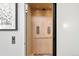 Modern elevator featuring paneled walls and integrated lighting at 42 S Ash St, Denver, CO 80246