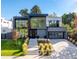 Stunning modern home with sleek design, large windows, and meticulously landscaped front yard at 42 S Ash St, Denver, CO 80246