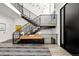 Impressive two-story foyer showcasing modern design elements and a striking staircase at 42 S Ash St, Denver, CO 80246
