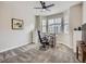Bedroom showcasing a desk, ceiling fan, and plush carpeting at 14310 Kalamath St, Westminster, CO 80023
