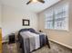 Cozy bedroom with a comfortable bed, side table, and plenty of natural light at 14310 Kalamath St, Westminster, CO 80023