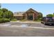 Community clubhouse with brick architecture, ample parking, and accessibility features at 14310 Kalamath St, Westminster, CO 80023