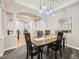 Dining room with decorative pendant lighting and carpeting at 14310 Kalamath St, Westminster, CO 80023