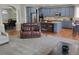 Beautiful kitchen featuring ample cabinet space, stainless steel appliances, and a breakfast bar, perfect for casual dining at 14310 Kalamath St, Westminster, CO 80023