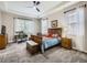 Main bedroom with tray ceiling and carpeting at 14310 Kalamath St, Westminster, CO 80023