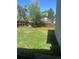 Spacious backyard with a wood fence providing privacy at 17477 E Temple Dr, Aurora, CO 80015