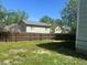 Home's backyard featuring a wood privacy fence at 17477 E Temple Dr, Aurora, CO 80015