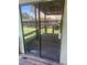 Sliding glass doors off of the back patio lead to the home's interior at 17477 E Temple Dr, Aurora, CO 80015