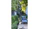 Secluded backyard patio with lush greenery, string lights, and comfortable seating, creating a tranquil retreat at 11223 W 29Th Ave, Lakewood, CO 80215