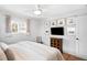 Bright bedroom with hardwood floors, closet space and decorative art at 11223 W 29Th Ave, Lakewood, CO 80215