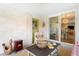 Enclosed sunroom offers a cozy retreat with views of the outdoors at 11223 W 29Th Ave, Lakewood, CO 80215