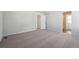 This bedroom offers neutral carpet, base trim and a bright open feel at 5784 Farmstead Pl, Mead, CO 80504
