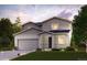 Two-story home with gray siding, two-car garage, and landscaped lawn at 5784 Farmstead Pl, Mead, CO 80504