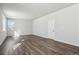 Spacious living area showcasing luxury vinyl flooring and bright lighting at 5784 Farmstead Pl, Mead, CO 80504