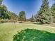 Beautifully landscaped community park with walking path and open green spaces for outdoor enjoyment at 400 Zang St # 1-105, Lakewood, CO 80228