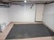 Unfinished basement with a large carpeted area at 2528 N Gilpin St, Denver, CO 80205