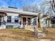 Two-story home with front steps and a well-maintained lawn at 2528 N Gilpin St, Denver, CO 80205