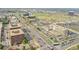 This aerial shot showcases the property's proximity to businesses, roads, and city amenities at 201 Wright St # 105, Lakewood, CO 80228