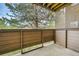 Private balcony with wood paneling, offering a peaceful outdoor retreat at 201 Wright St # 105, Lakewood, CO 80228