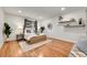 Bright bedroom with hardwood floors, large window and neutral decor creating a serene and inviting space at 201 Wright St # 105, Lakewood, CO 80228