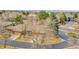 Panoramic aerial view of the house highlighting mature trees, tidy lawn and overall neighborhood setting at 8040 W 78Th Way, Arvada, CO 80005