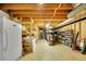 Unfinished basement with shelving and storage at 8040 W 78Th Way, Arvada, CO 80005
