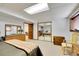 Finished basement bedroom with mirror sliding closet doors and dresser at 8040 W 78Th Way, Arvada, CO 80005
