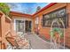 Cozy patio features brickwork, sliding glass doors, and outdoor seating, perfect for relaxing at 8040 W 78Th Way, Arvada, CO 80005