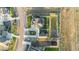 Stunning aerial view of home showcasing lush landscaping and long driveway at 10080 E 160Th Pl, Brighton, CO 80602