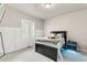 Bedroom with a comfortable bed, window shutters, and a modern aesthetic perfect for rest and relaxation at 10080 E 160Th Pl, Brighton, CO 80602