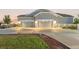 Spacious three-car garage with an extended driveway and well-manicured lawn at 10080 E 160Th Pl, Brighton, CO 80602