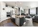 Modern kitchen featuring stainless steel appliances, granite countertops, and an open layout at 10080 E 160Th Pl, Brighton, CO 80602