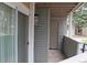 Outdoor patio features sliding glass doors and privacy wall at 922 S Walden St # 101, Aurora, CO 80017