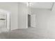 Large bedroom with neutral carpet flooring provides ensuite bathroom access and good natural light at 1631 Egret Way, Superior, CO 80027