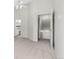 Bedroom showcases an open layout, integrating space that leads to the upstairs bathroom at 1631 Egret Way, Superior, CO 80027