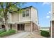 Charming townhome with attached garage, brick accents, and a well-kept lawn in a friendly neighborhood at 1631 Egret Way, Superior, CO 80027