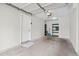 Spacious two car garage featuring door to exterior and shelving for storage at 1631 Egret Way, Superior, CO 80027