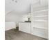 Bright open-concept living space with built-in shelving, recessed lighting, and a view into the kitchen at 1631 Egret Way, Superior, CO 80027