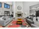 The resident lounge features two couches, a fireplace, and coffee bar at 1631 Egret Way, Superior, CO 80027