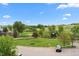 Beautiful aerial view of the neighborhood park including green space and playground at 1631 Egret Way, Superior, CO 80027