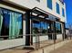 Modern salon with large window displays for makeup, extensions, and beauty studio at 4219 Pecos St, Denver, CO 80211