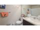 Half bathroom featuring modern fixtures, light colored walls, and ample lighting at 8707 E Florida Ave # 410, Denver, CO 80247