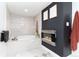 Luxurious bathroom with a soaking tub and modern fireplace for a spa-like experience at 9742 Fairwood St, Littleton, CO 80125