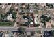 Aerial view of a property outlined in red, displaying its location near Dartmouth Avenue and the surrounding neighborhood at 2561 W Dartmouth Ave, Denver, CO 80236