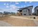 Exterior view of a two story home featuring wood deck and fenced yard at 24708 E 40Th Ave, Aurora, CO 80019