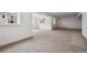 Spacious unfinished basement with carpet and large windows at 24708 E 40Th Ave, Aurora, CO 80019