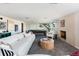Finished basement featuring a pool table, fireplace, and spacious seating area at 26 Morningside Dr, Wheat Ridge, CO 80215