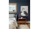 Charming bedroom features natural light, stylish decor, and a comfortable sleeping space at 26 Morningside Dr, Wheat Ridge, CO 80215